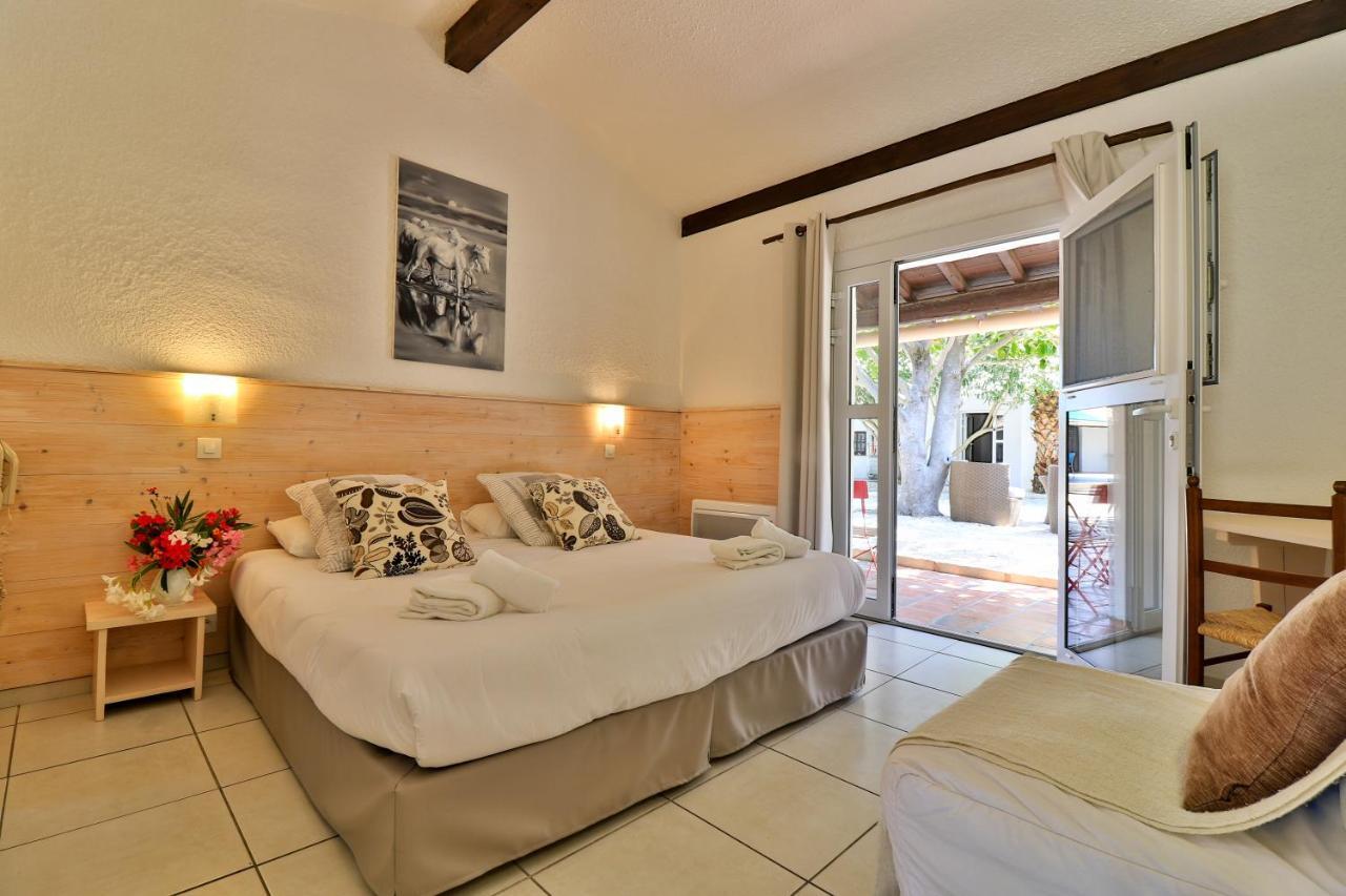 Les Rizieres Hotel แซ็งต์-มารี-เดอ-ลา-แมร์ ภายนอก รูปภาพ